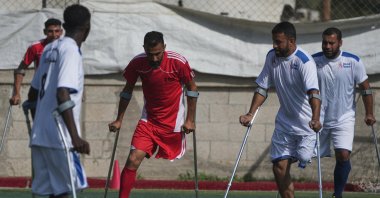 Palestinians, some of whom were injured in previous conflicts and others in the current Israeli bombardments on Gaza, take part in a football tournament for amputees, Deir al-Balah, Gaza Strip, Palestine, Nov. 17, 2025. (AP Photo)