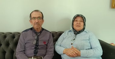 Parents of Turkish scientist Furkan Dölek, Hasan (L) and Zuhal Dölek, speak at their home in Kozan, Adana, southern Türkiye, Nov. 7, 2025. (AA Photo)