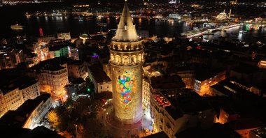 As part of Türkiye E-Commerce Week, the Galata Tower hosted a light-mapping show illustrating the data flows and digital rhythm of modern e-commerce, Istanbul, Türkiye, Nov. 18, 2025. (AA Photo)