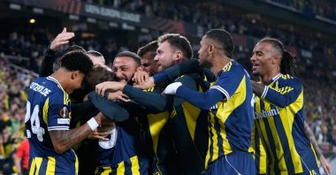 Fenerbahçe&#039;s players celebrate after Kerem Aktürkoğlu scored the opening goal during the Europa League match against Nice at Chobani Stadium, Istanbul, Türkiye, Oct. 2, 2025. (AP Photo)