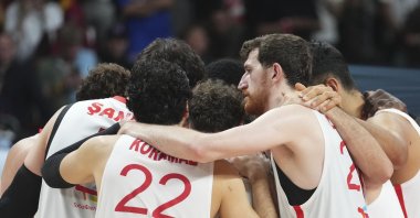 Türkiye players react at the end of the Eurobasket, European Basketball Championship final match against Germany at the Riga Arena, Riga, Latvia, Sept. 14, 2025. (AP Photo)