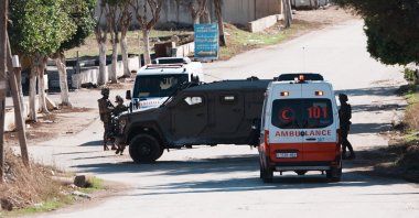 An Israeli military vehicle blocks an ambulance from entering the town of Tubas during an operation, in the northern West Bank, Palestine, Nov. 26, 2025. (AA Photo)