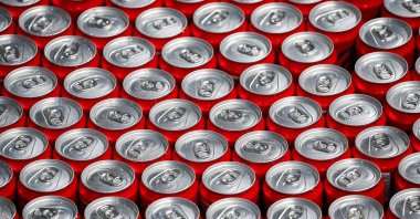 Aluminum cans of Coca-Cola move along a conveyor belt on the production line at the Coca-Cola Europacific Partners bottling plant, Marseille, France, May 7, 2024. (Reuters Photo)
