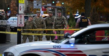 National Guard soldiers stand behind the crime scene tape after a shooting in downtown Washington, D.S., U.S., Nov. 26, 2025. (AFP Photo)
