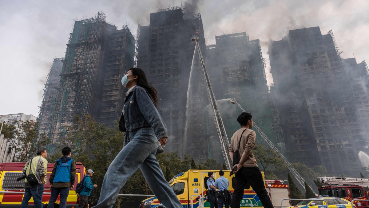 Construction firm bosses arrested as Hong Kong fire death toll hits 83