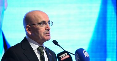 Treasury and Finance Minister Mehmet Şimşek delivers a speech at an event, Ankara, Türkiye, Nov. 20, 2025. (AA Photo)
