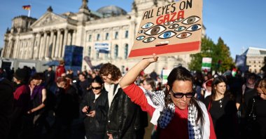 People protest against Israel in front of the German parliament Reichstag during a mass demonstration called "All Eyes on Gaza" in support of Palestinians in Berlin, Germany, Saturday, Sept. 27, 2025. (AP File Photo)