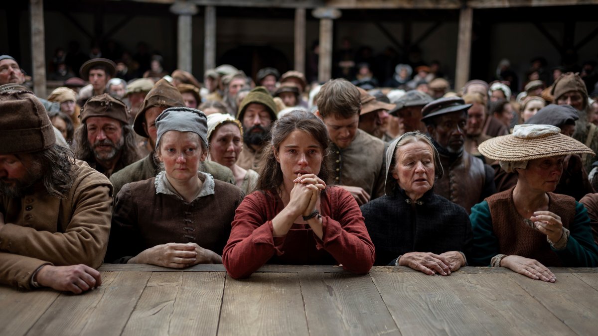 Jessie Buckley (C) in a scene from "Hamnet." (Focus Features Handout via AP Photo)