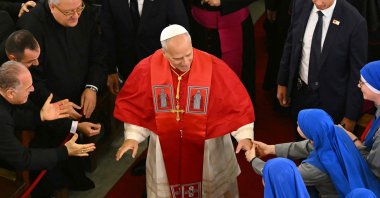 Pope Leo XIV arrives at the Cathedral of the Holy Spirit (St. Esprit Cathedral) for a meeting with bishops, priests, deacons, consecrated men and women, and pastoral workers, Istanbul, Türkiye, Nov. 28, 2025. (AFP Photo)