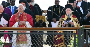 Pope Leo XIV and Greek Orthodox Patriarch Bartholomew attend a prayer service near the sunken Byzantine Basilica of Saint Neophytos by Lake Iznik, Iznik, western Bursa province, Türkiye, Nov. 28, 2025. (AFP Photo)