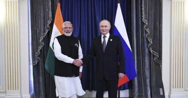 Indian Prime Minister Narendra Modi (L)and Russian President Vladimir Putin shake hands during their meeting on the sidelines of the Shanghai Cooperation Organization (SCO) summit, Tianjin, China, Sept. 1, 2025. (AP Photo)