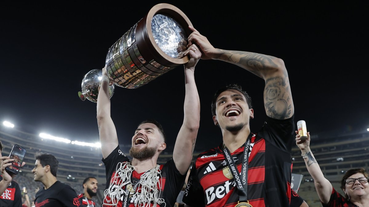 Players of Flamengo celebrate with the trophy after winning the Copa Libertadores final against Palmeiras, in Lima, Peru, Nov. 29, 2025. (EPA Photo)