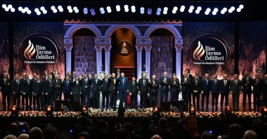 Family photo of the 2025 Ilim Yayma Award winners, jury members and organizers at the ceremony held at Atatürk Cultural Center, Istanbul, Türkiye, Nov. 29, 2025. (AA Photo)