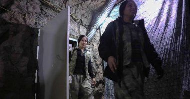 PKK members walk through a cave network in the Qandil mountains, Iraq, Nov. 29, 2025. (AFP Photo)