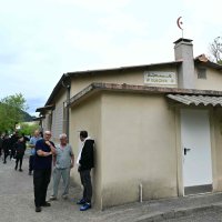 People stand outside a mosque in La Grand-Combe, southern France, April 27, 2025. (AFP Photo)