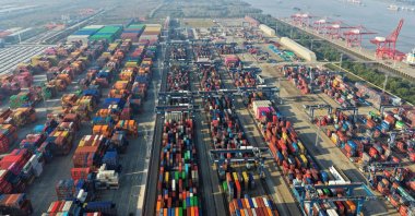 An aerial view shows containers at the container terminal of the port in Nanjing, China, Nov. 12, 2025. (AFP Photo)