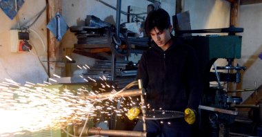 A worker is seen at a factory in Kars province, eastern Türkiye, Nov. 18, 2025. (AA Photo)