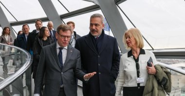 Minister of Foreign Affairs Hakan Fidan (C) walks with his German counterpart Johann David Wadephul (L), during their visit to the German parliament, Berlin, Germany, Nov. 28, 2025.(IHA Photo)
