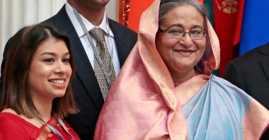 Tulip Siddiq (L) stands beside then-Bangladesh Prime Minister Sheikh Hasina in the Kremlin in Moscow, Russia, Jan. 15, 2013. (AP Photo)
