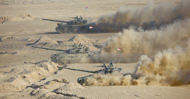 Tajikistan&#039;s tanks roll during a joint military drills by Russia and Uzbekistan at Harb-Maidon firing range about 20 kilometers (about 12 miles) north of the Tajik border with Afghanistan, in Tajikistan, Aug. 10, 2021. (AP Photo)