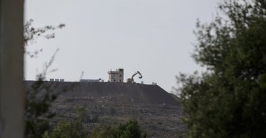 Israeli military builds security barriers around the areas it occupies in rural Quneitra, southwestern Syria, Nov. 5, 2025. (AA Photo)