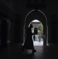 A man walks inside a mosque in Paris, France, Oct. 29, 2020. (AP Photo)