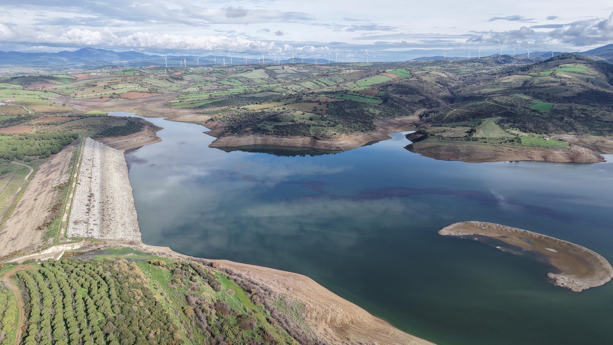 Aerial view shows water reservoirs partially dried due to the ongoing drought in Çanakkale, Türkiye, Dec. 2, 2025. (DHA Photo)
