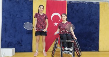 Turkish para-badminton players Eylül Yılmaz (R) and Irem Nur Yazgan train ahead of their respective international tournaments at Atatürk Sports Hall, Hatay, Türkiye, Nov. 29, 2025. (AA Photo)