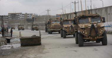 British troops with NATO-led Resolute Support Mission forces travel in Kabul, Afghanistan, March 25, 2020. (AP Photo)