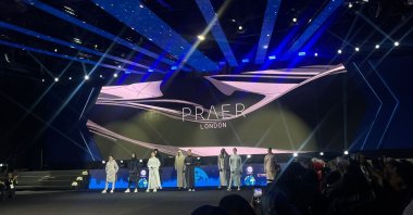 Models pose while presenting new modest fashion collections at the Modest Fashion and Art Trade Show held as part of the Halal Expo 2025, Istanbul, Türkiye, Nov. 29, 2025. (Photo by Betül Tilmaç)