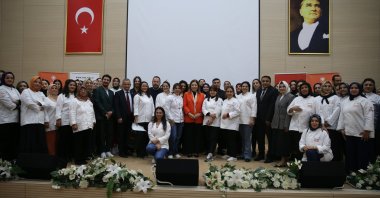 KADEM project participants gather for a group photo celebrating the completion of their vocational training and empowerment program, Hatay, Türkiye, Dec. 3, 2025. (AA Photo)