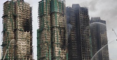 A scene at the rescue site in Wang Fuk Court, a residential area in Tai Po of Hong Kong, south China, Nov. 27, 2025. (EPA Photo)