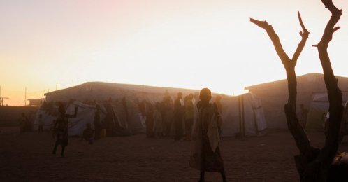 Sudanese refugees running away from atrocities by paramilitary Rapid Support Forces (RSF) in el-Fasher gather at sunset in the Tine transit camp, in eastern Chad, Nov. 23, 2025. (Reuters Photo)