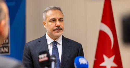 Foreign Minister Hakan Fidan speaks to reporters after NATO meeting in Brussels, Dec. 3, 2025. (AA Photo)