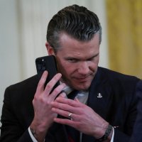 U.S. Defense Secretary Pete Hegseth uses a phone as he attends a joint press conference of U.S. President Donald Trump and Israeli Prime Minister Benjamin Netanyahu in the East Room at the White House, Washington, U.S., Feb. 4, 2025. (Reuters Photo)