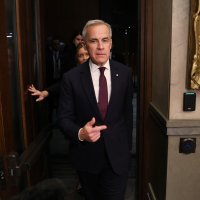 Canada&#039;s Prime Minister Mark Carney exits the House of Commons after attending Question Period on Parliament Hill on Nov. 17, 2025 in Ottawa, Canada. (AFP File Photo)