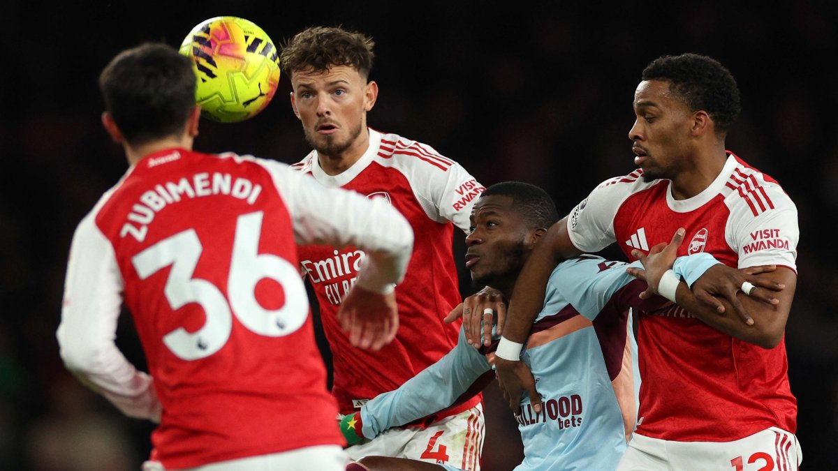 Arsenal's Martin Zubimendi (L), Ben White (2L) and Jurrien Timber (R) vie with Brentford's Dango Ouattara during the English Premier League football match at the Emirates Stadium, London, U.K., Dec. 3, 2025. (AFP Photo)