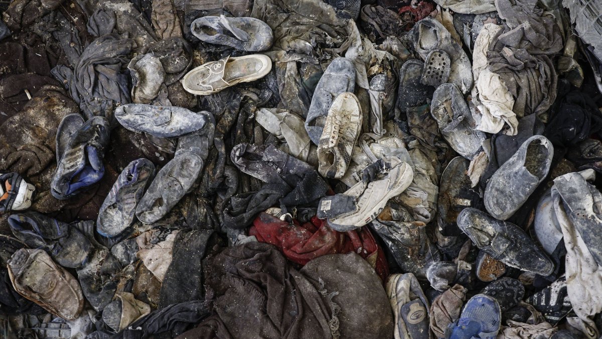 Shoes belonging to prisoners pile up inside a cell of the Sednaya prison, dubbed by Amnesty International as the 'Human Slaughterhouse', near Damascus, Syria, Dec.12, 2024. (EPA File Photo)