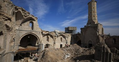 Workers carry out restoration work inside the Great Omari Mosque, which was damaged by Israeli shelling during the war, Gaza City, Palestine, Nov. 17, 2025. (Reuters Photo)