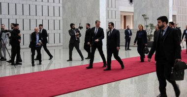 Syrian Foreign Minister Asaad al-Shaibani (C R) arrives for a reception with the U.N. Security Council delegation at the presidential palace in Damascus, Syria, Dec. 4, 2025. (EPA Photo)