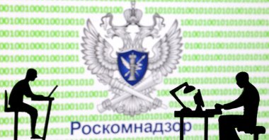 Miniatures of people with computers are silhouetted in front of binary codes and Roskomnadzor (RKN) logo in this illustration taken, April 23, 2024. (Reuters File Photo)