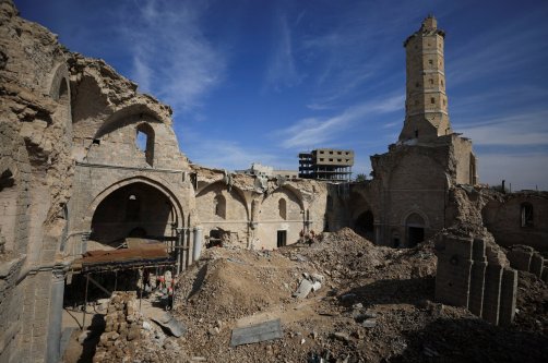 Workers carry out restoration work inside the Great Omari Mosque, which was damaged by Israeli shelling during the war, Gaza City, Palestine, Nov. 17, 2025. (Reuters Photo)