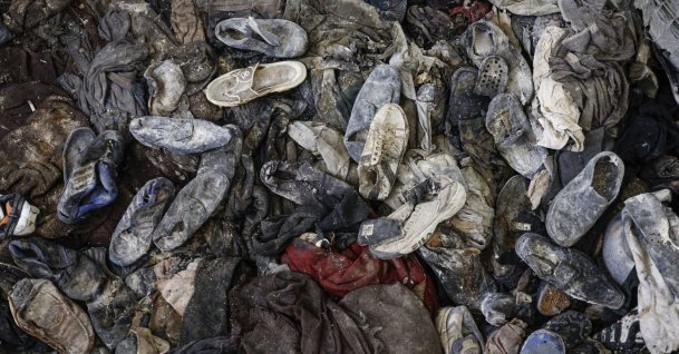 Shoes belonging to prisoners pile up inside a cell of the Sednaya prison, dubbed by Amnesty International as the 'Human Slaughterhouse', near Damascus, Syria, Dec.12, 2024. (EPA File Photo)
