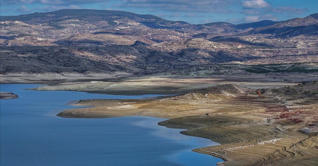 An aerial view of the partially emptied Çamlıdere Dam shows the visibly reduced water levels in Ankara, Türkiye, Dec. 3, 2025. (AA Photo)