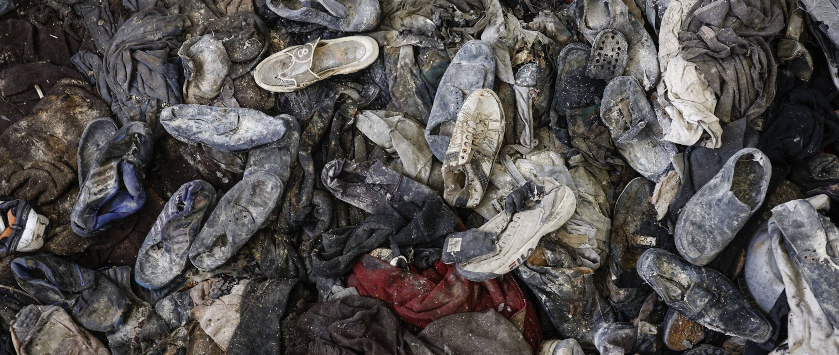 Shoes belonging to prisoners pile up inside a cell of the Sednaya prison, dubbed by Amnesty International as the &#039;Human Slaughterhouse&#039;, near Damascus, Syria, Dec.12, 2024. (EPA File Photo)