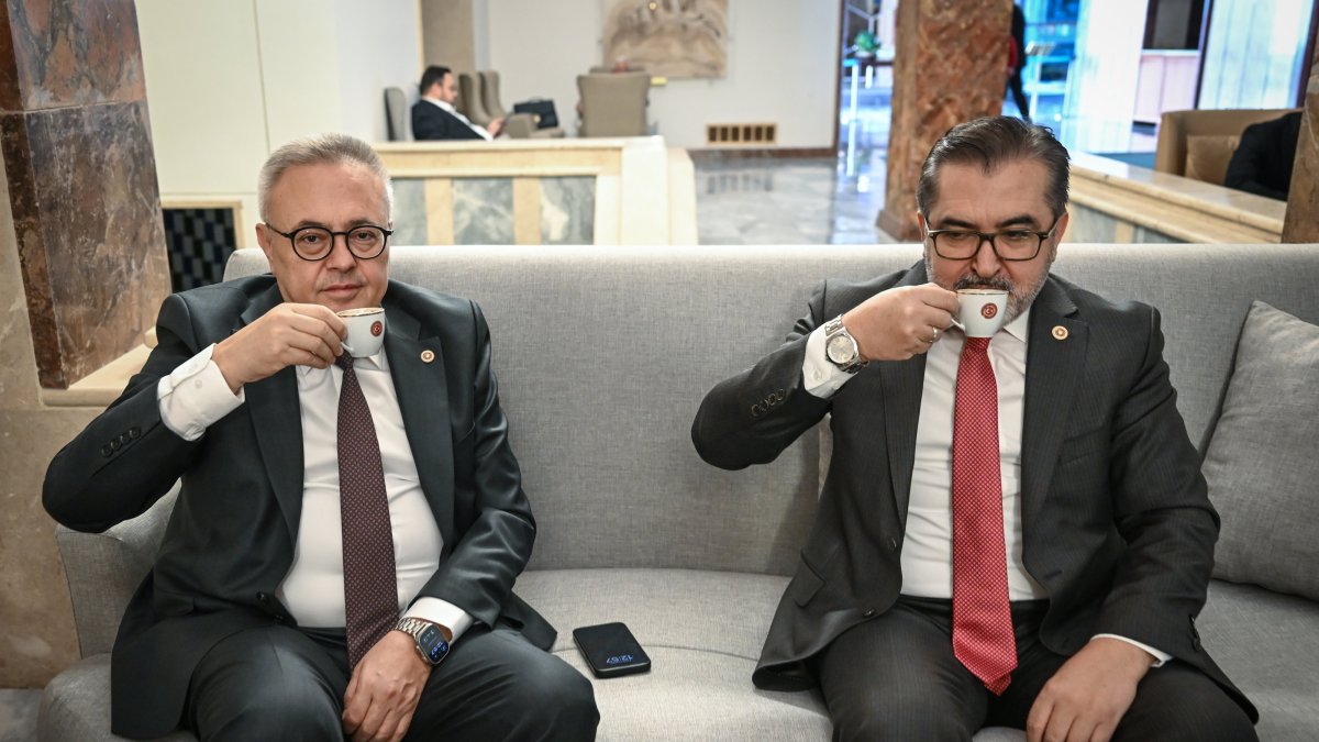 The Justice and Development Party (AK Party) lawmaker Adem Yıldırım (R) and Republican People&#039;s Party (CHP) lawmaker Ali Karaoba (L) share Turkish coffee at Parliament, Ankara, Türkiye, Dec. 4, 2025. (AA Photo)
