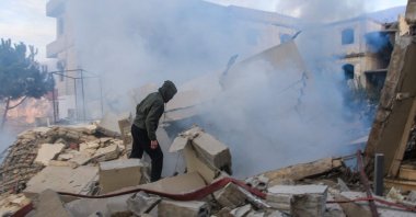 A man inspects the damage at the site of an Israeli airstrike that targeted the southern village of Jbaa, Lebanon, Dec. 4, 2025. (AFP Photo)