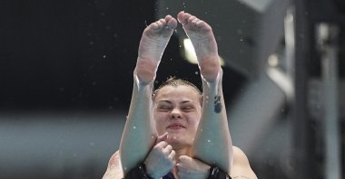 Sofiia Lyskun of Ukraine competes in the women&#039;s 10m platform diving preliminaries at the World Aquatics Championships, Singapore, July 30, 2025. (AP Photo)
