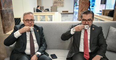The Justice and Development Party (AK Party) lawmaker Adem Yıldırım (R) and Republican People&#039;s Party (CHP) lawmaker Ali Karaoba (L) share Turkish coffee at Parliament, Ankara, Türkiye, Dec. 4, 2025. (AA Photo)