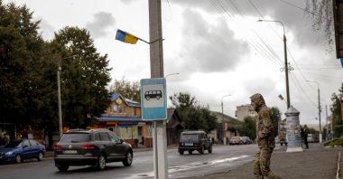 A Ukrainian soldier crosses a street in Hoshcha, a rural community that has experienced a declining birthrate, amid Russia&#039;s attack, Ukraine, Oct. 2, 2025. (Reuters Photo)